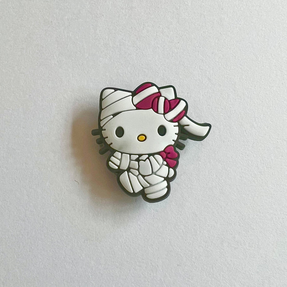 Mummified Hello Kitty Charm