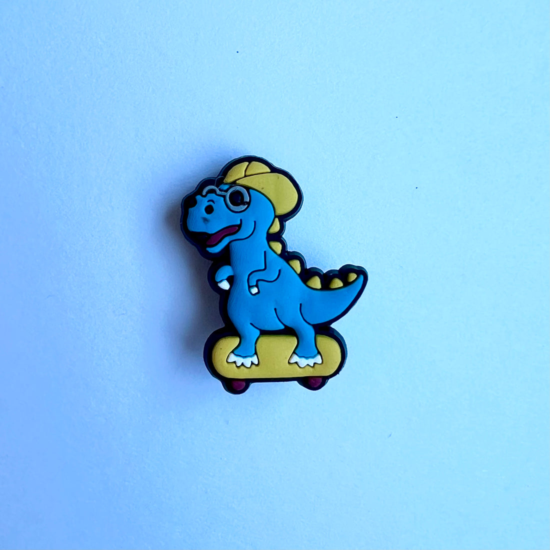 Skateboarding Dino Charm